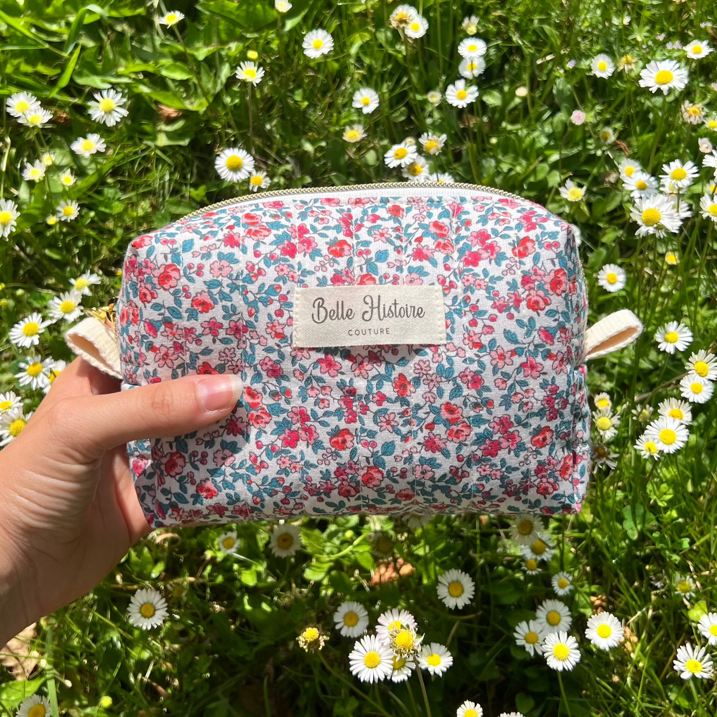 Trousse à maquillage matelassée fleurs roses